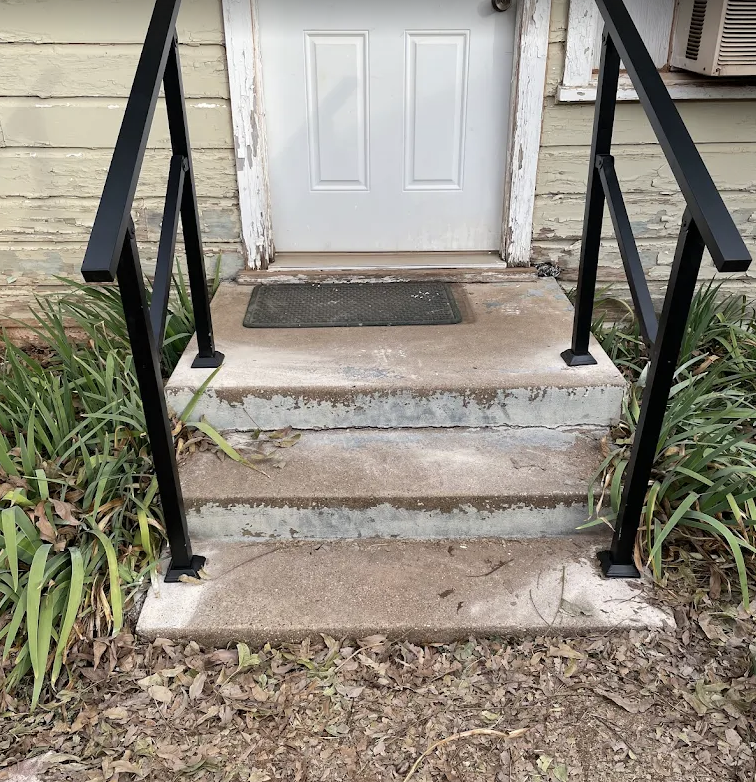 Porch railing and home repair work by Roe Construction
